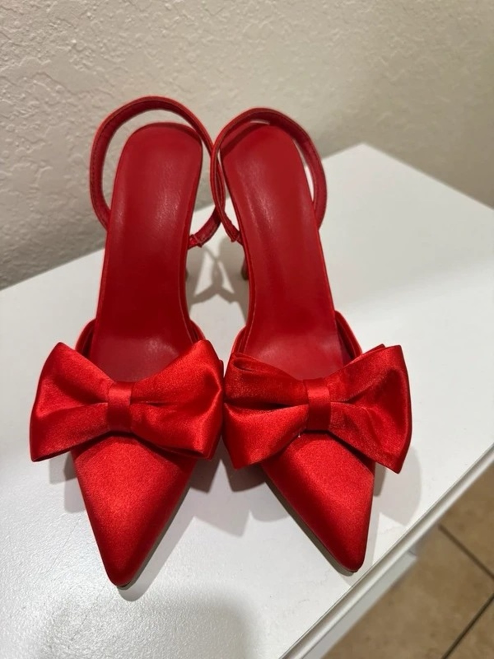 Elegant Red Satin Pointed Slingback Heels with Bow Accent